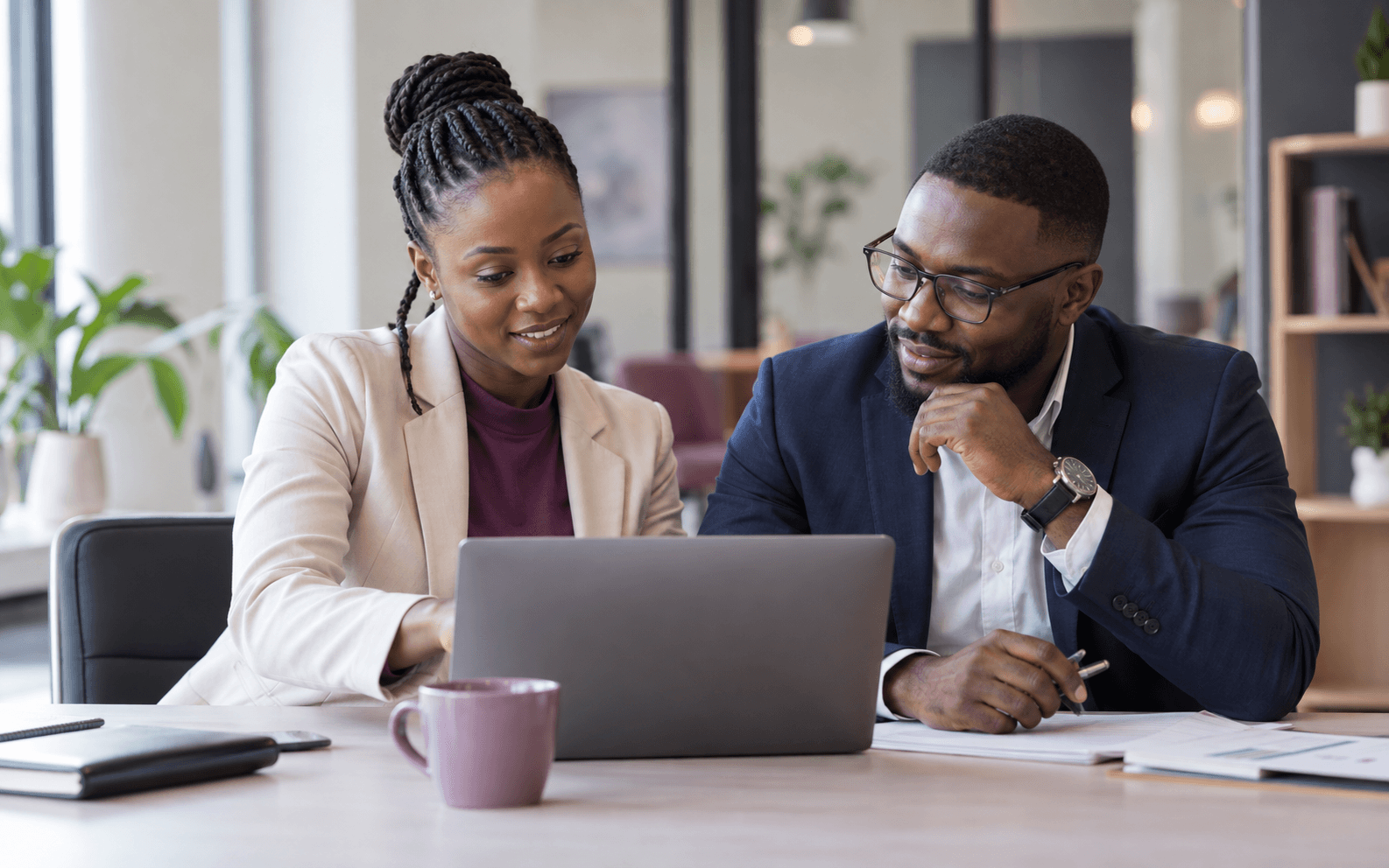 Education recruitment consultants reviewing a university application together